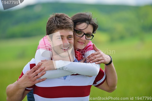 Image of romantic young couple in love together outdoor