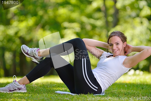Image of woman stretching before fitness