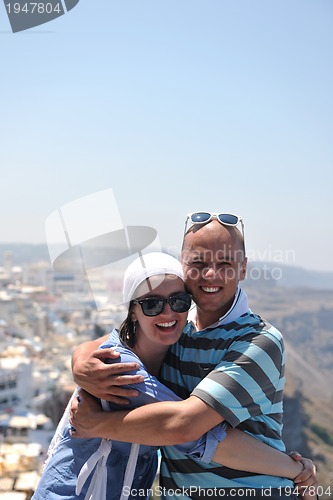 Image of happy young couple tourists in greece