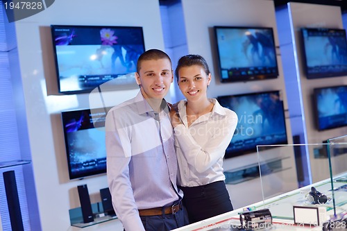 Image of people buy  in consumer electronics store