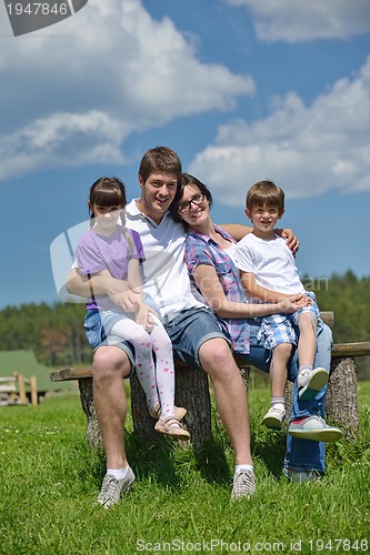 Image of happy young family have fun outdoors