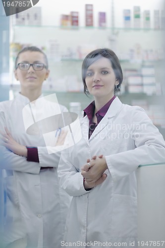 Image of team of pharmacist chemist woman  in pharmacy drugstore