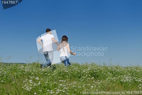 Image of happy couple in wheat field