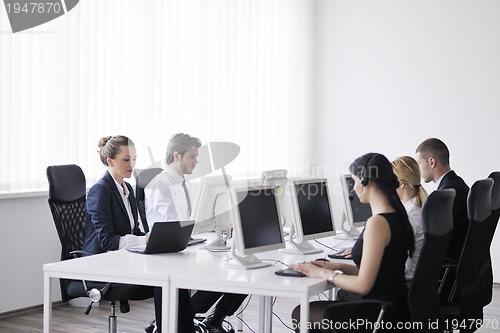 Image of business people group working in customer and help desk office