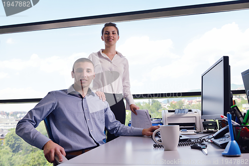 Image of business people in a meeting at office