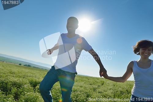 Image of happy couple in wheat field