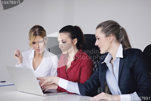 Image of business woman group with headphones