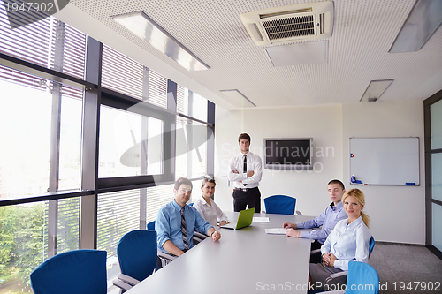 Image of business people in a meeting at office