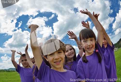 Image of happy kids group  have fun in nature