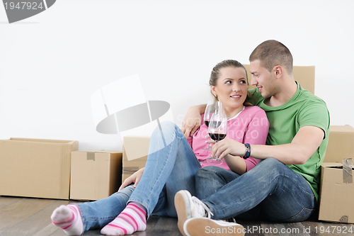 Image of Young couple moving in new house