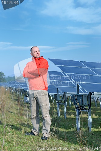 Image of Male solar panel engineer at work place