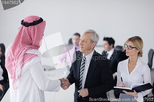 Image of Arabic business man at meeting