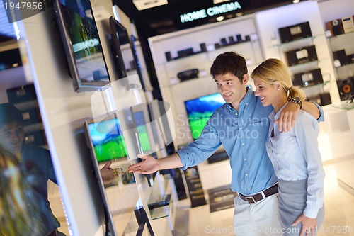 Image of people buy  in consumer electronics store