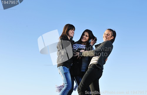 Image of group of teens have fun outdoor