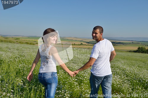 Image of happy couple in wheat field