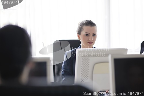 Image of business people group working in customer and help desk office