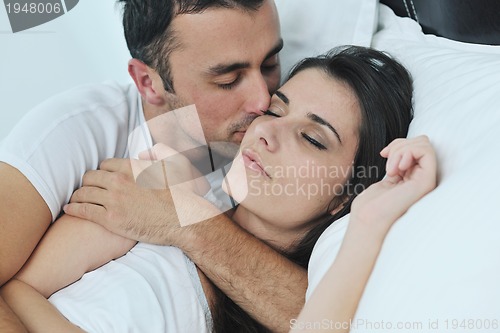 Image of young couple have good time in their bedroom