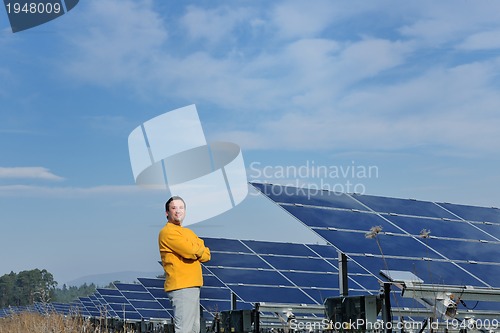 Image of Male solar panel engineer at work place