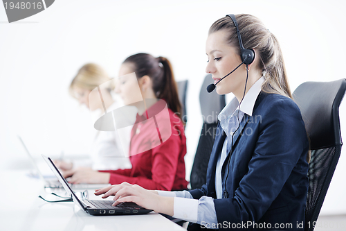 Image of business woman group with headphones