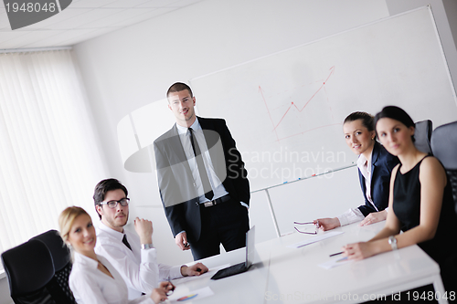 Image of business people in a meeting at office