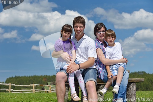 Image of happy young family have fun outdoors