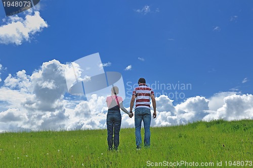 Image of romantic young couple in love together outdoor