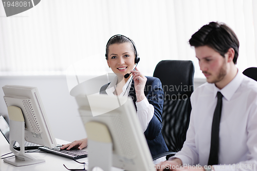 Image of business people group working in customer and help desk office