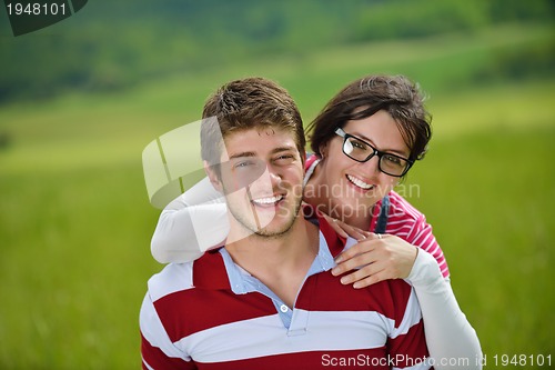 Image of romantic young couple in love together outdoor