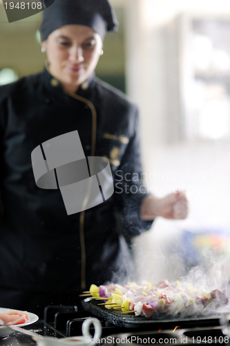 Image of chef preparing meal