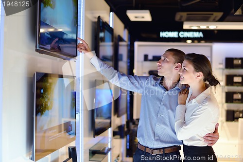 Image of people buy  in consumer electronics store