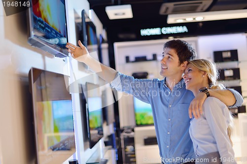 Image of people buy  in consumer electronics store