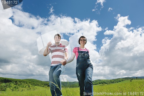 Image of romantic young couple in love together outdoor