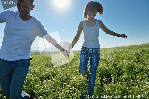 Image of happy couple in wheat field