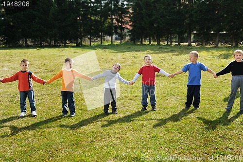 Image of preschool  kids outdoor have fun