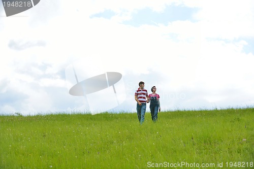 Image of romantic young couple in love together outdoor