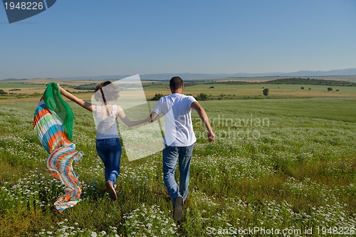 Image of happy couple in wheat field