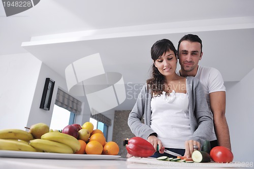 Image of young couple have fun in modern kitchen