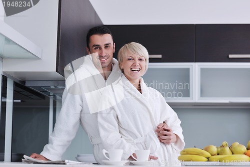 Image of young couple have fun in modern kitchen