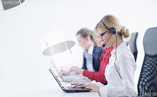 Image of business woman group with headphones