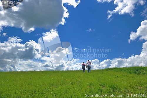 Image of romantic young couple in love together outdoor