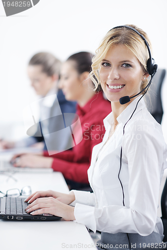 Image of business woman group with headphones