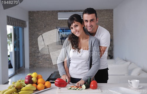 Image of young couple have fun in modern kitchen
