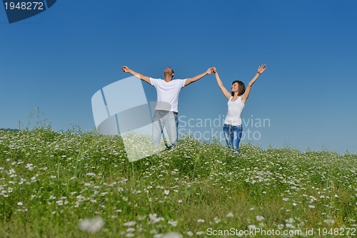 Image of happy couple in wheat field