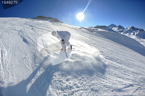 Image of skiing on fresh snow at winter season at beautiful sunny day