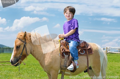 Image of child ride pony