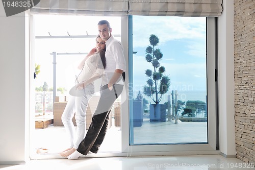 Image of happy young couple relax at home