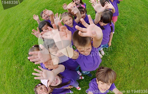 Image of happy kids group  have fun in nature