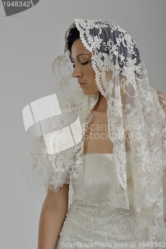 Image of Portrait of a beautiful woman dressed as a bride