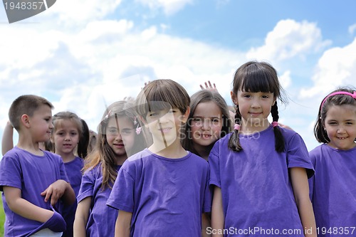 Image of happy kids group  have fun in nature