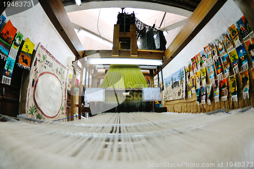 Image of traditional arabic rug production